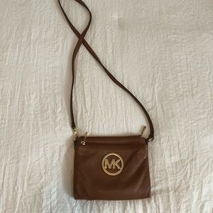 Michael Kors crossbody purse with wallet feature